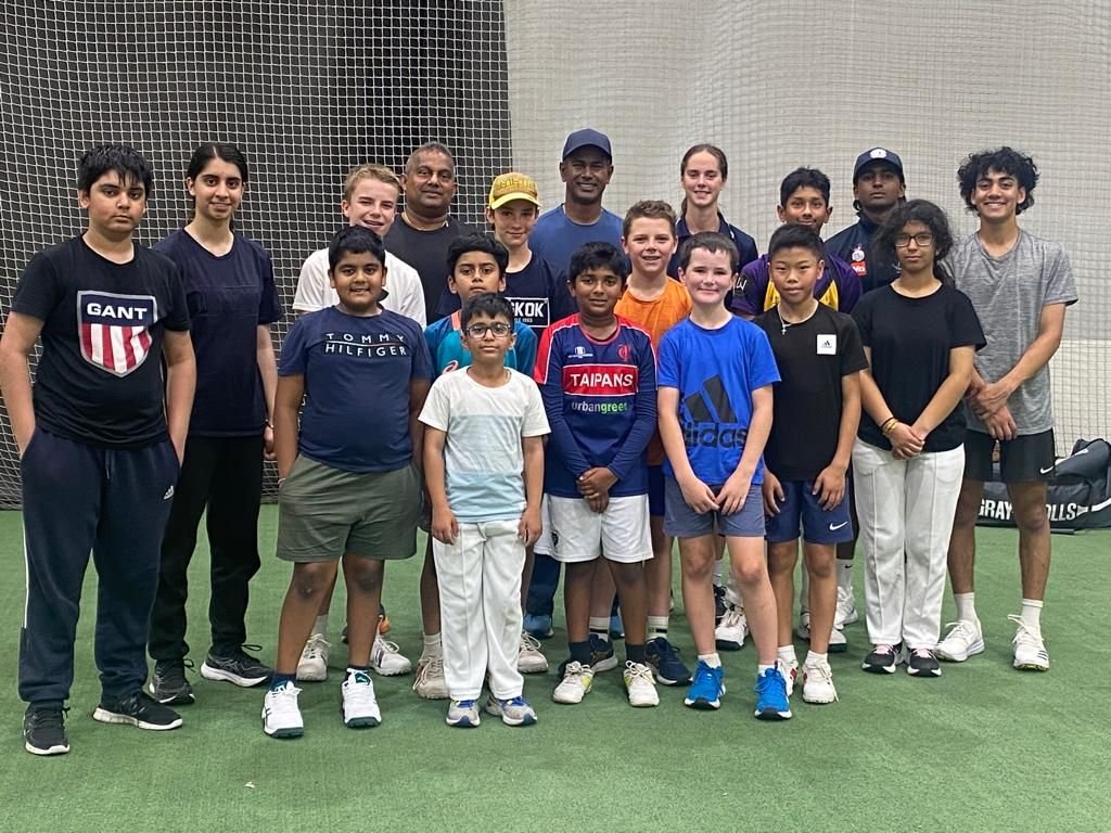 Team of young players together after a session
